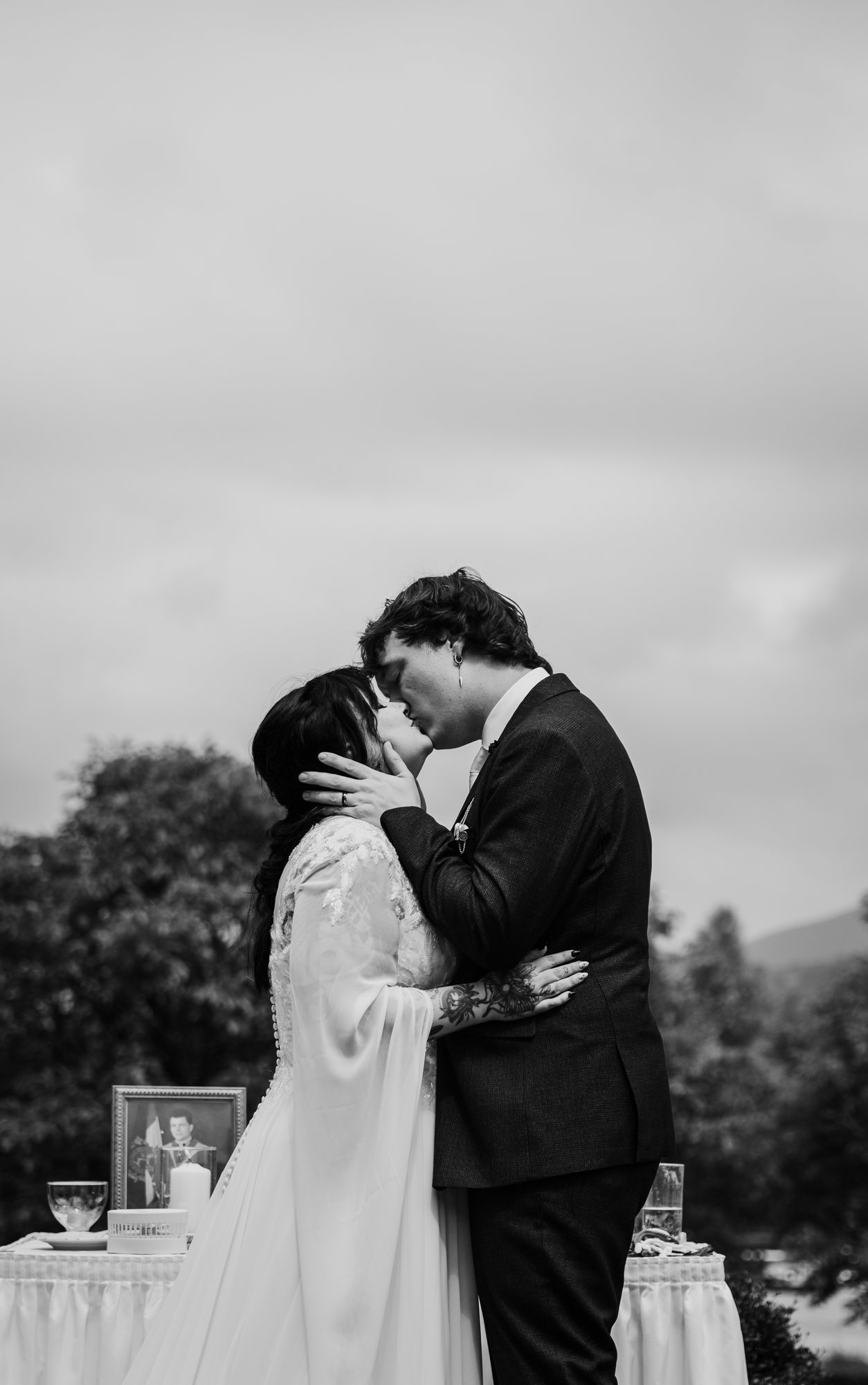 Newlyweds sharing a kiss after their ceremony